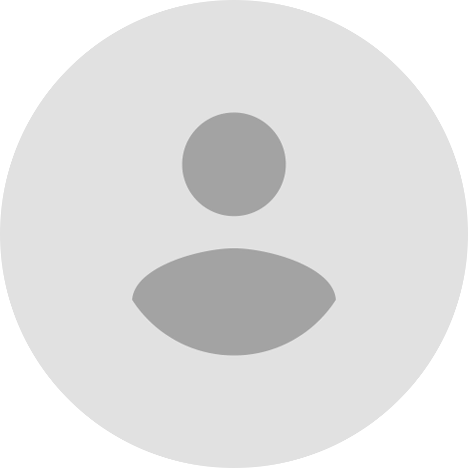 A white circle with a person 's face in it.