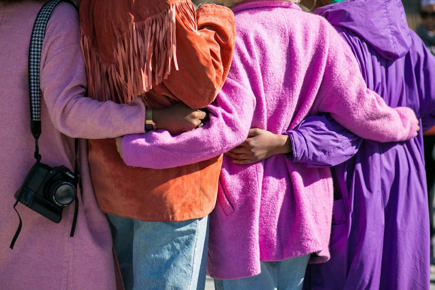 A group of people standing next to each other.