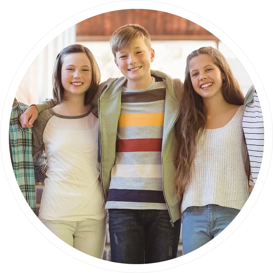 Three young people posing for a picture.