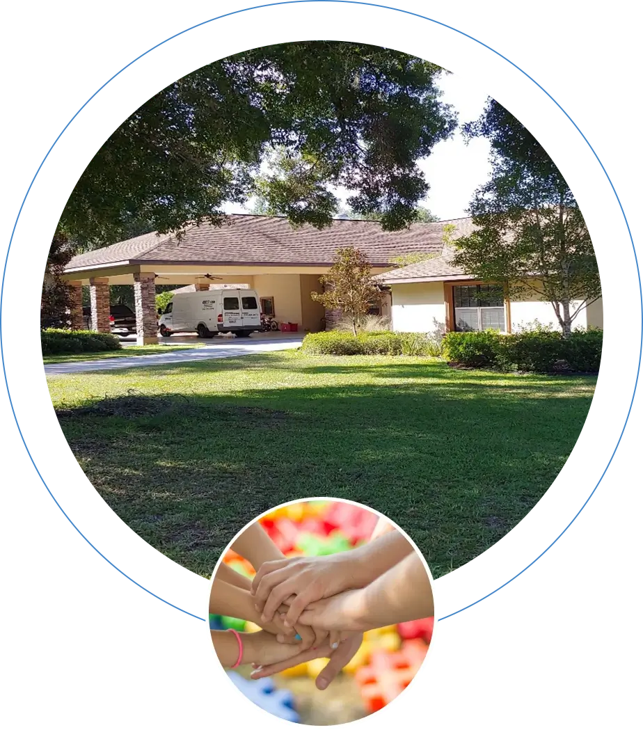 A picture of a house with the image of two hands holding candy.